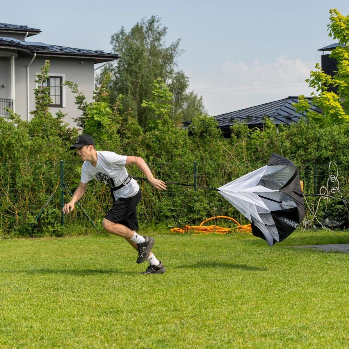 Hockey player running at full speed outdoors during off-ice training session